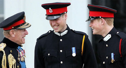 12 April 2006: The Duke of Edinburgh speaks to Prince William and Prince Harry at Sandhurst Royal Military Academy after The Sovereign's Parade that marked the completion of Prince Harry's Officer training