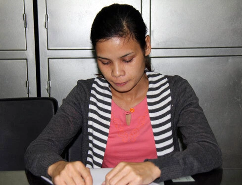 Lệ tại cơ quan điều tra. Ảnh: Song Anh.