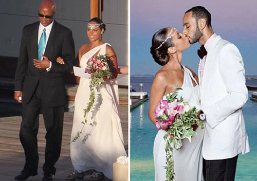 Alicia Keys mặc chiếc váy lụa trắng của Vera Wang cho đám cưới của mình với Swizz Beatz. Cô trông như một nữ thần khi chọn váy cưới lệch vai và thay khăn voan bằng chiếc vòng ngọc trai trên đầu. Alicia Keys mặc chiếc váy lụa trắng của Vera Wang cho đám cưới của mình với Swizz Beatz. Cô trông như một nữ thần khi chọn váy cưới lệch vai và thay khăn voan bằng chiếc vòng ngọc trai trên đầu.