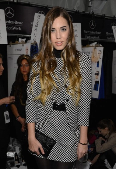 The Michael Kors show also saw Amber Le Bon model a black and white mini check jacket and matching skirt, both by Michael Kors.