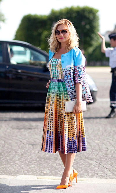 Nasiba Adilova in Mary Katrantzou and Reece Hudson clutch. Nasiba Adilova in Mary Katrantzou and Reece Hudson clutch.