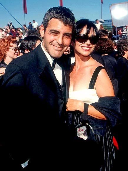 George Clooney và Karen Duffy George Clooney và Karen Duffy