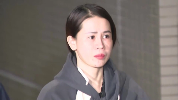 Dinh Thi Huong khi bị bắt. Ảnh: FNN